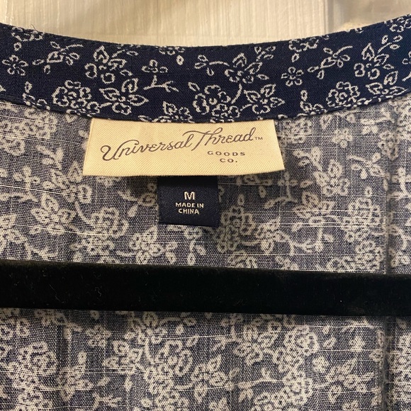 Navy Floral Jumpsuit - Picture 2 of 5